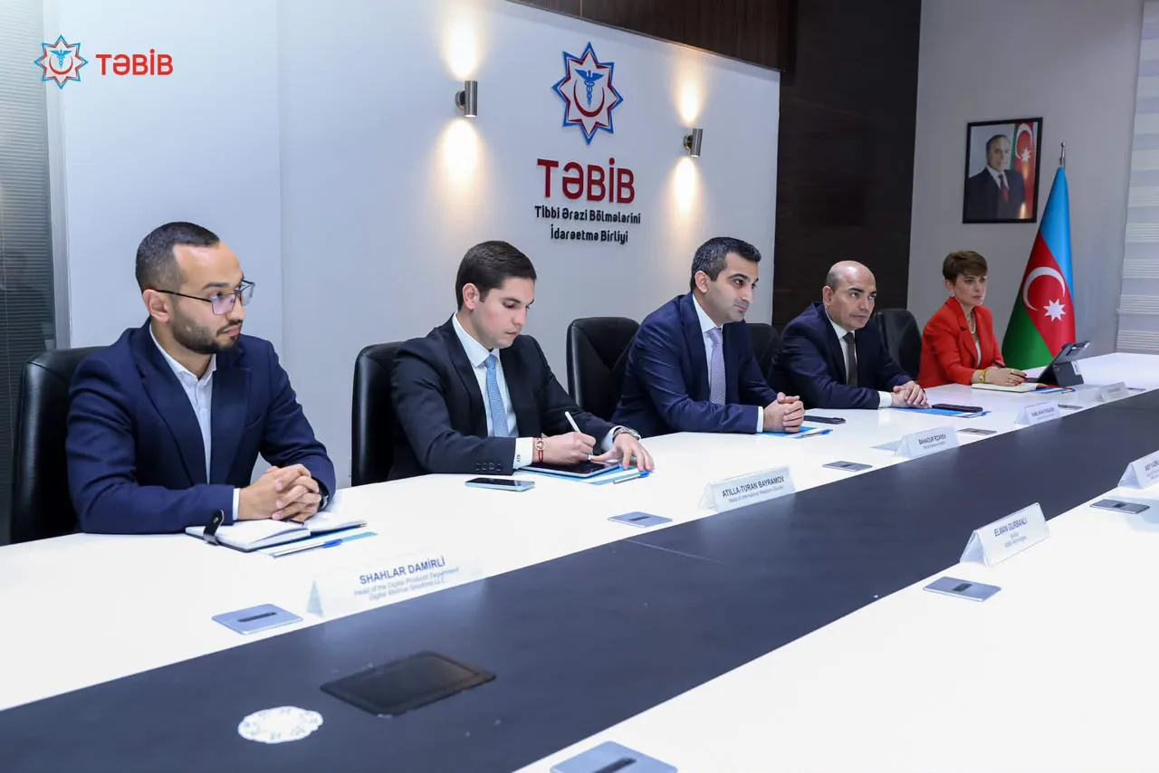 Members of the TƏBİB delegation during the meeting at the agency's Baku headquarters.